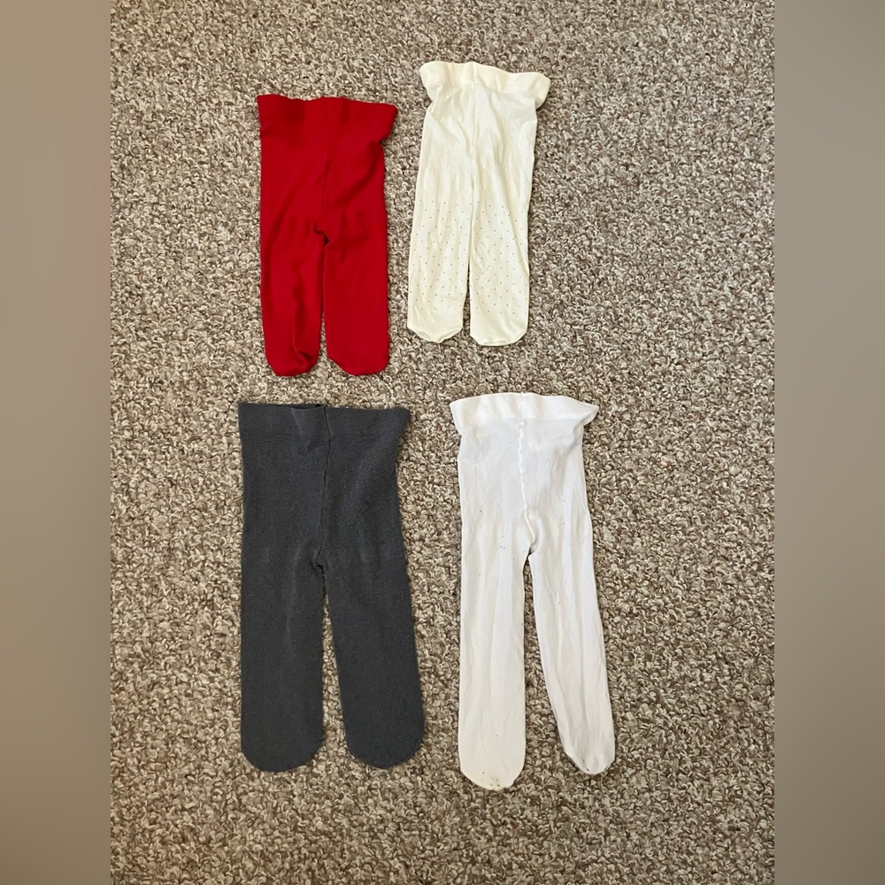 Six pairs of baby girls tights